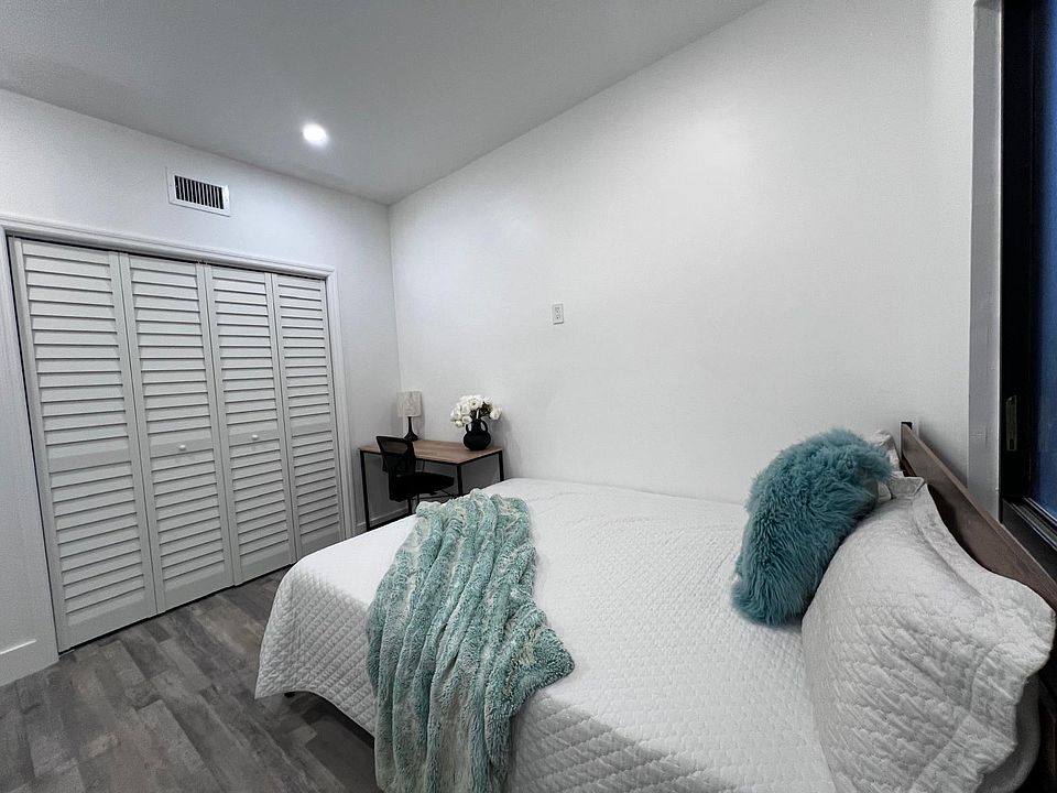Large room with queen size bed and a huge double closet.