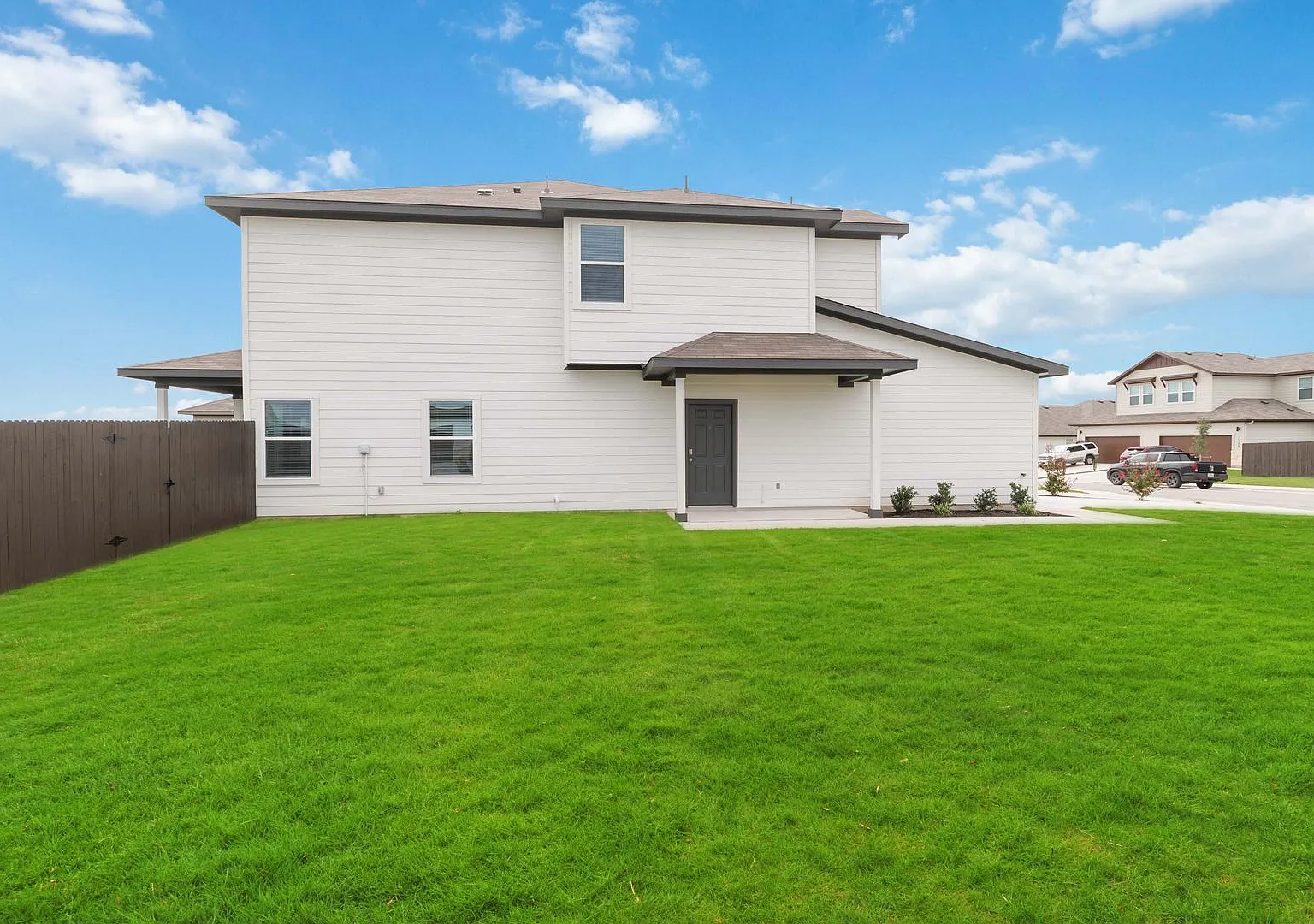 Brand-New 3-Bedroom Emma Park Townhome with Private Yard & 2-Car Garage — Photo 3