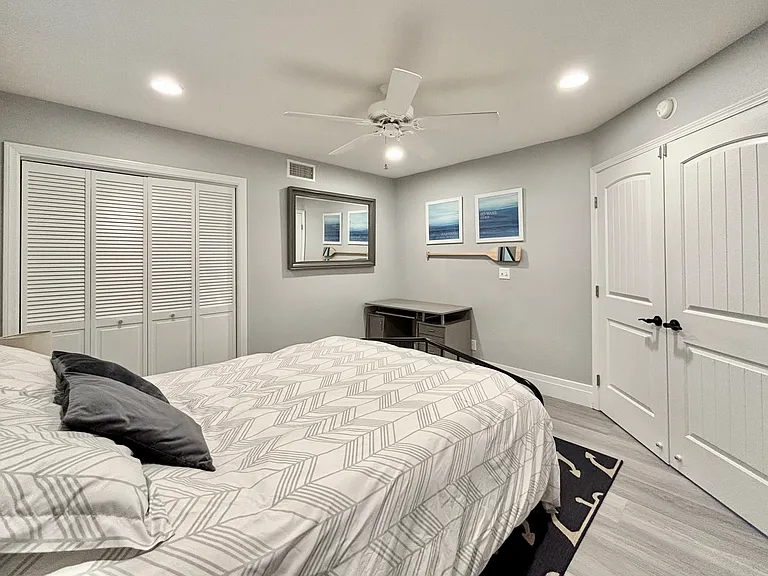 Downstairs bedroom with queen bed