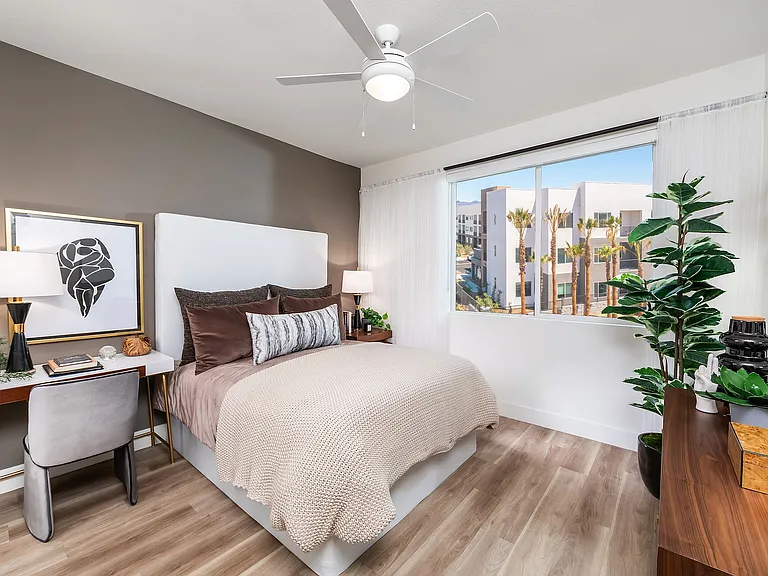 Secondary bedroom with light wood style flooring