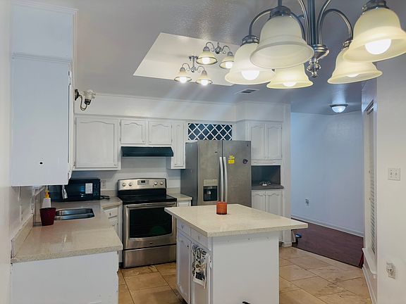 kitchen with provided appliances
