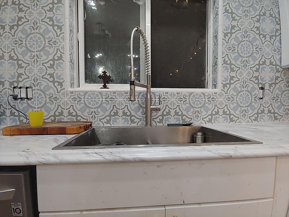 Deep sink and industrial faucet