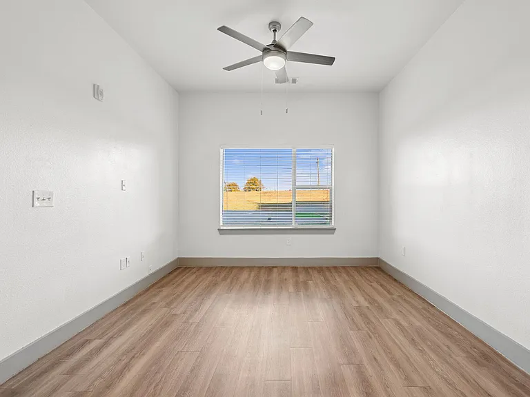 Spacious Bedrooms with Ceiling Fan