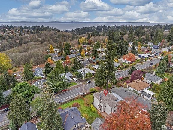 Set in a perfect spot with easy access to parks and business, shopping, etc.  Entry from the alley too for the two car garage. 