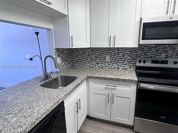 3rd image of 10049 Winding Lake Rd APT 103
