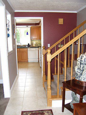 Entry hall from door way looking into kitchen