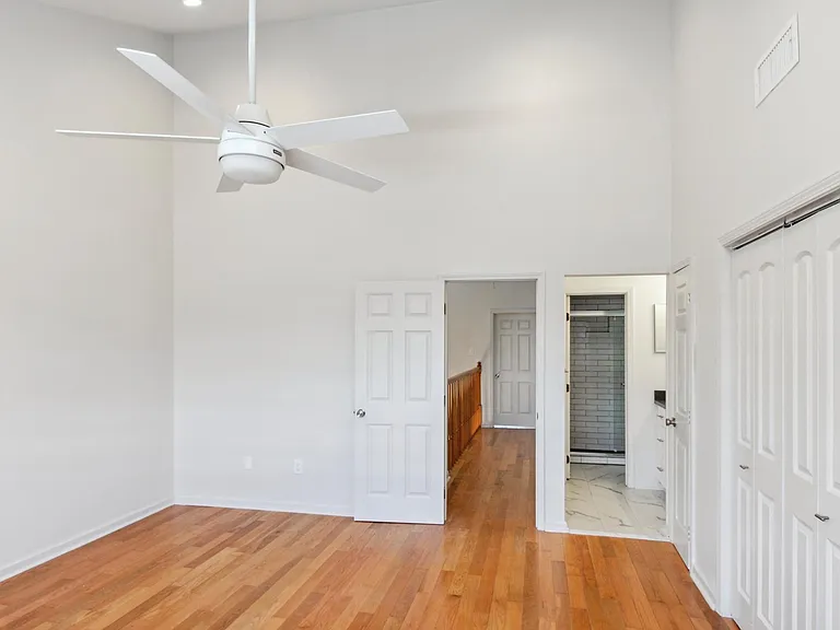 View of Master Bedroom toward Master Bathroom and front bedroom.
