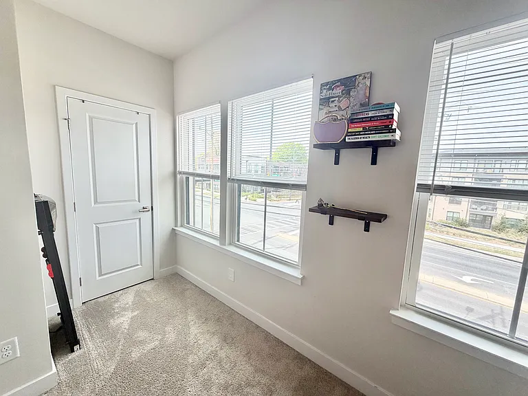 2nd bedroom with natural light, closet and attached full bathroom