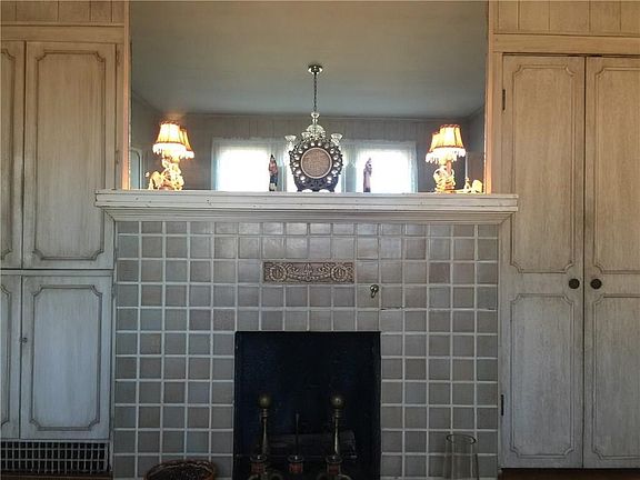 Formal dining fireplace.  One of four fireplaces in the house, this one ads a glamourous flair to the formal dining.