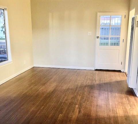 View of Front door in Living room.