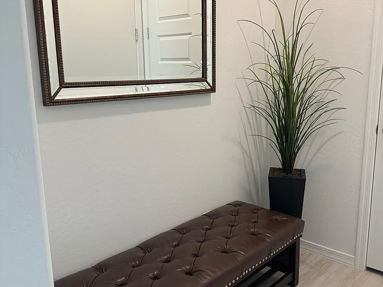 Entry from garage with great bench for getting shoes on etc.