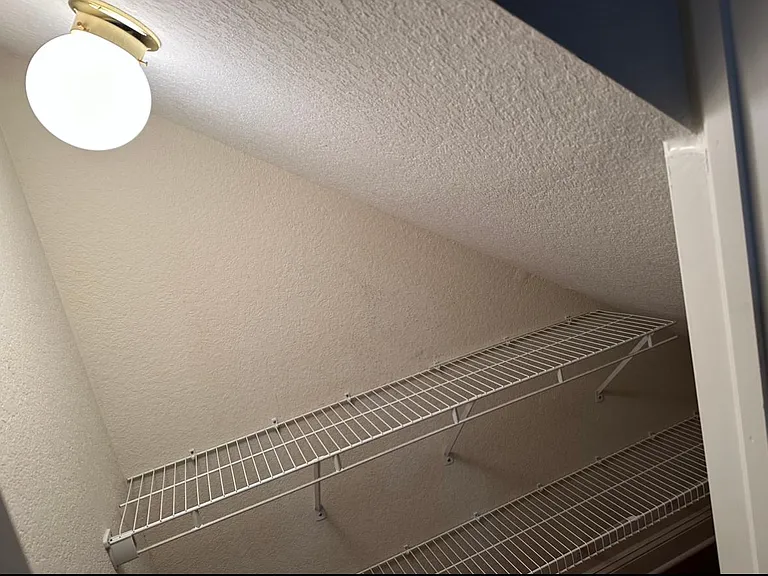 Under stairs storage/pantry. More storage not shown to the right
