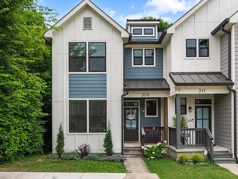 This lovely townhome (left unit) blends modern conveniences with plenty of charm.