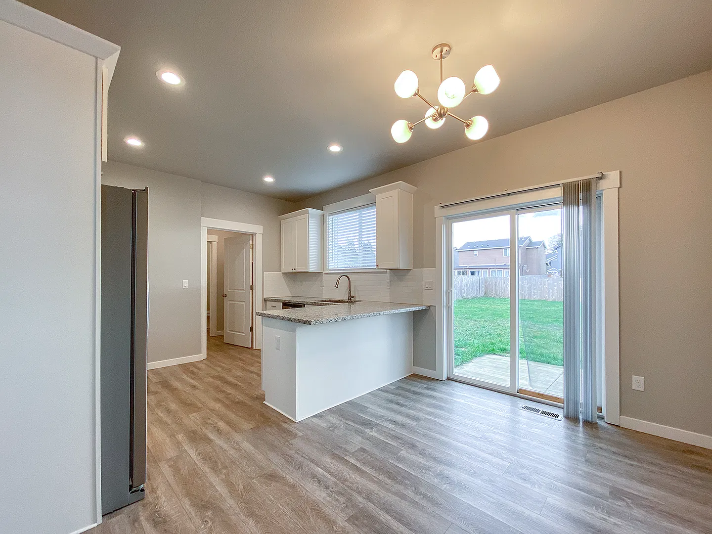 Bright & Modern 4-Bedroom Home with Spacious Backyard and Stylish Upgrades — Photo 4