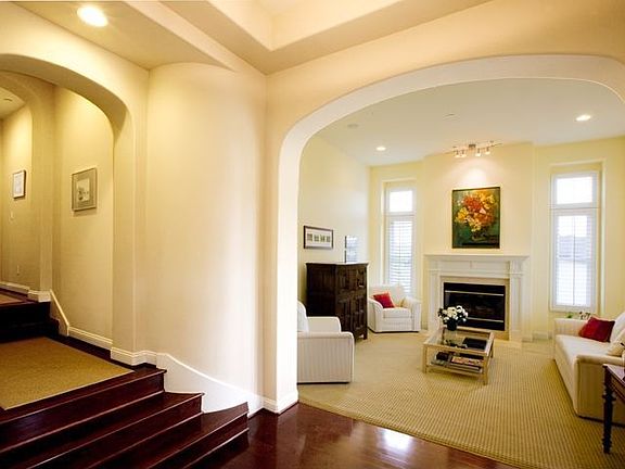 Formal Living Room With Soaring Ceiling