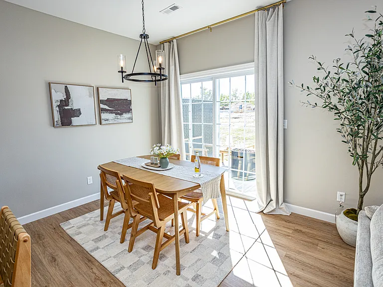 Dining area leading into back patio