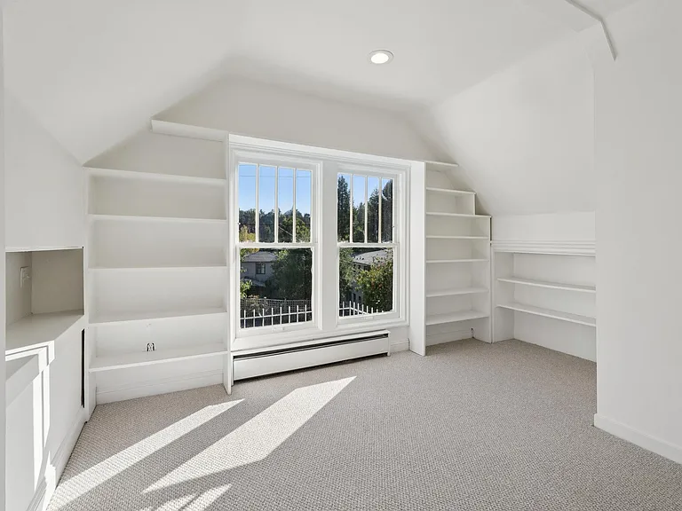office space with built in shelving.