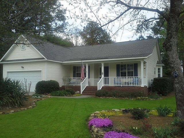 Beautiful landscape and large covered porch
