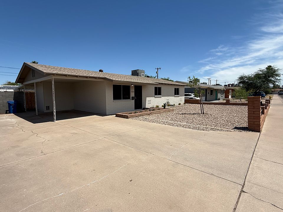 Exterior Front: Great curb appeal. New paint and front yard xeriscape; has plenty of parking.