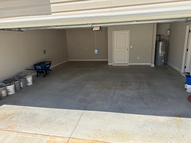 Large 2 car garage with storage area