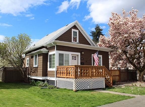 Fenced back yard with paid landscaping.