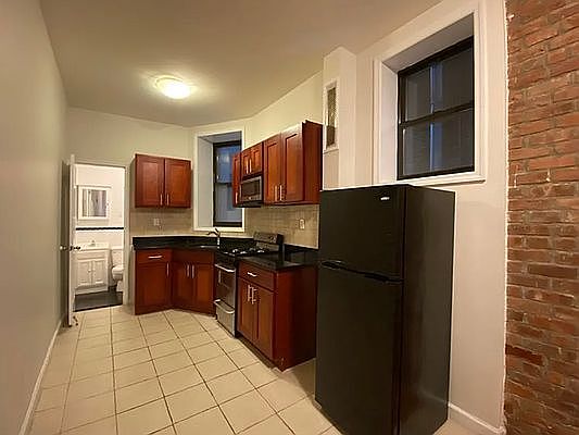 5th image of 329 W 35th St APT 1E