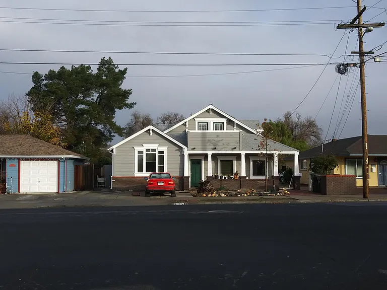 Front of house. Driveway to the right, between 1270 and the yellow house next door. Unit #3 is in back upstairs.