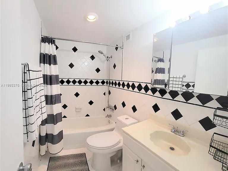 400 S Kings Point Dr #220 — Photo 10