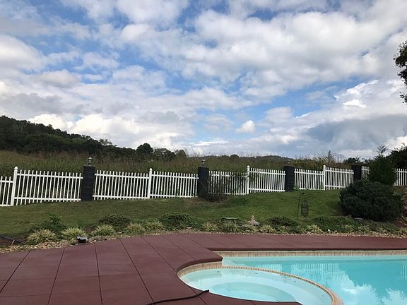 Pool with meadow beyond