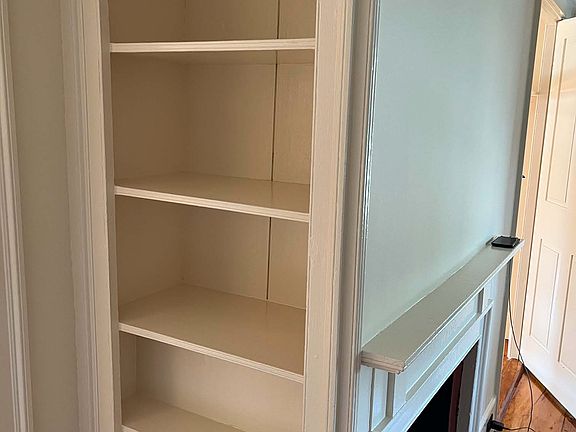 Extra shelving in living room.