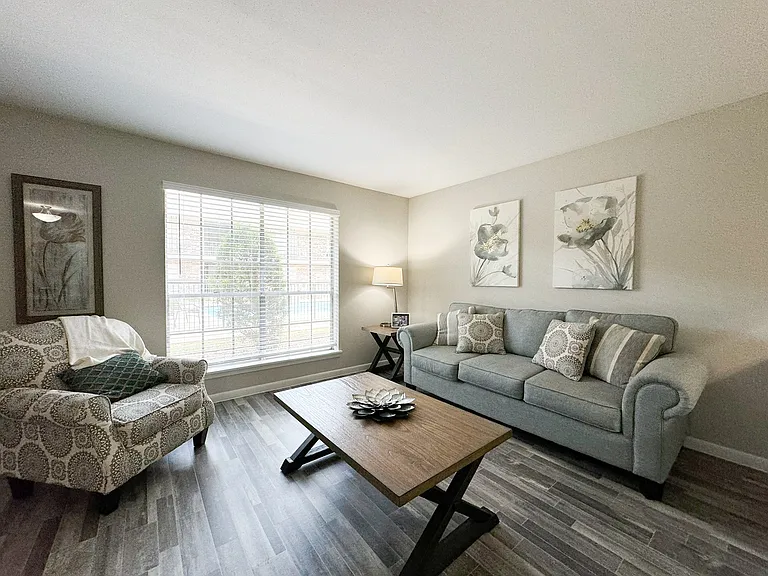 Open-plan living room with cozy seating
