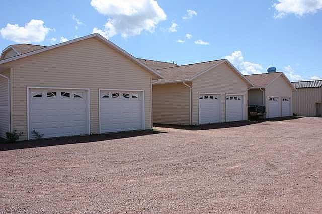 1 car garage with opener for each unit.