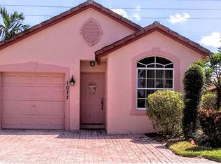 1077 Via Jardin, Riviera Beach, FL 33418