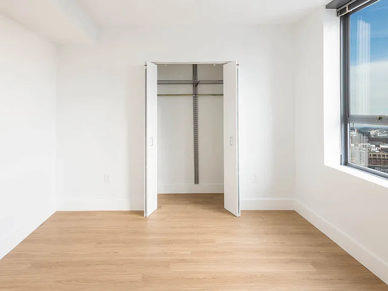 Studio Living Space with Hardwood Flooring