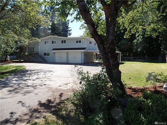 Looking for space??  Over 2700 sq ft on double lot with 2 car garage and double carport.  Great lot is level and private.