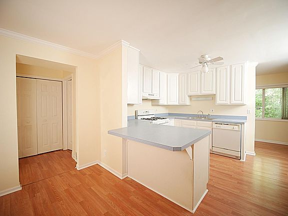 Kitchen between Living Room and Den.