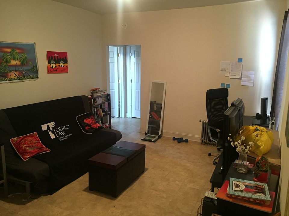 Living room, foyer in background, while standing in living r