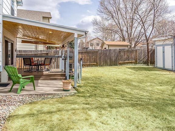 Back yard, covered patio and shed