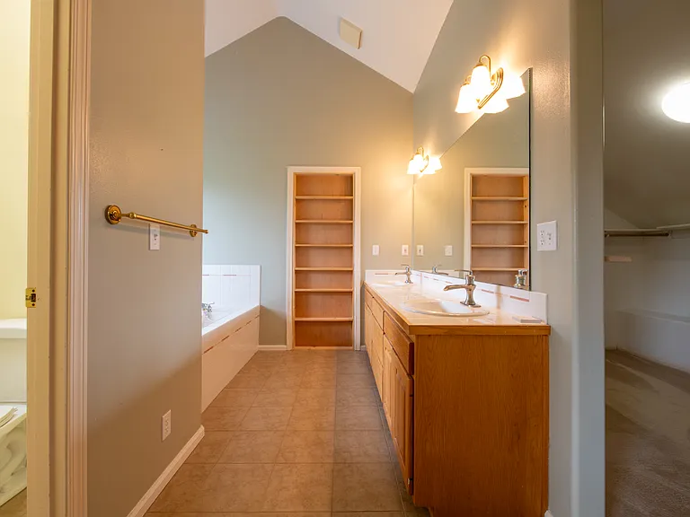 Master Bath (shower/toilet to left, walk-in closet to right)