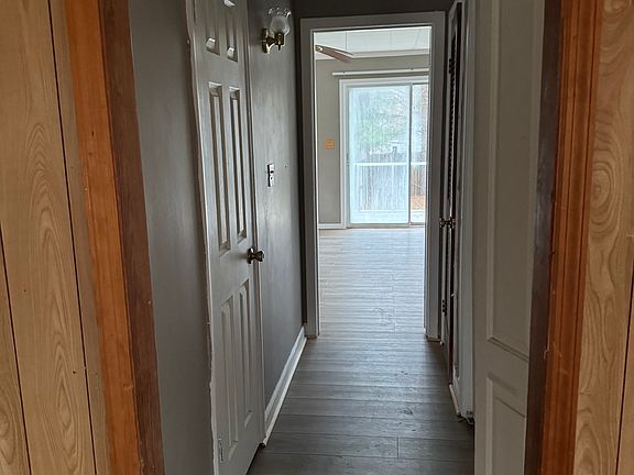 HALL TO BEDROOM 1/BATH ON LEFT/LAUNDRY ON RIGHT