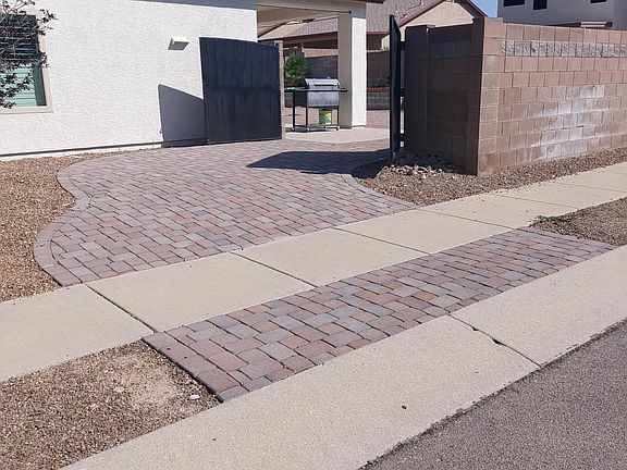 Unique side access to rear through double gate allows for additional parking for a trailer, etc.