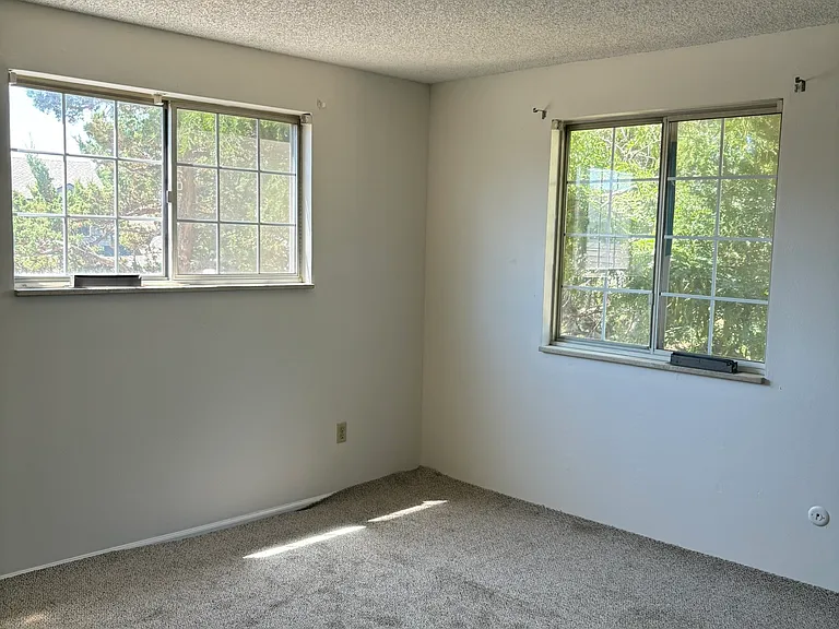Large primary bedroom with ensuite bath and walk in closet