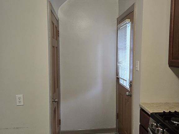 To backyard and basement from kitchen.