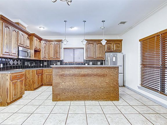 Large Kitchen with custom oak cabinets