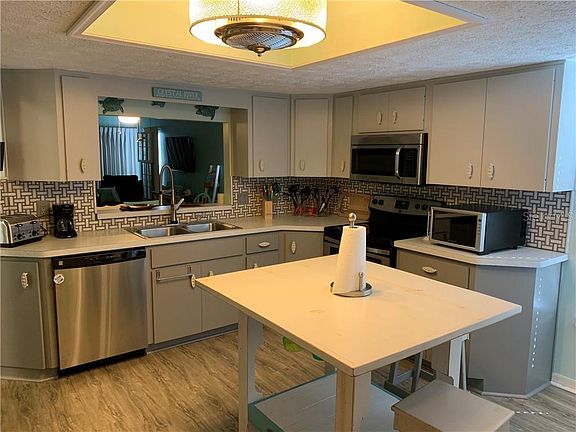 4th image of 11052 W Cove Harbor Dr #1