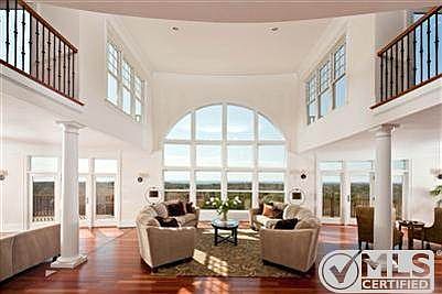 The great room is the main living area on the first floor, all ready for entertaining large groups o