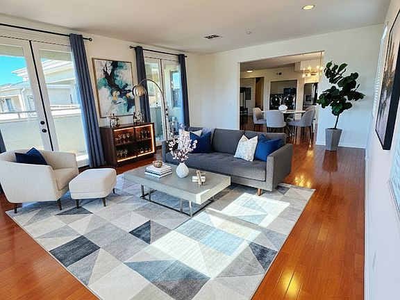 Living room. This photo is virtually staged and for illustration purposes only. Furniture is not included.