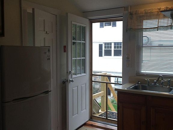 Kitchenette and Front Door to Stairs