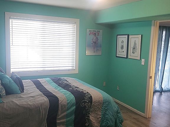 Master bedroom walk in closet and attached Master bathroom