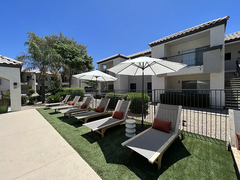 Lounge in luxury by our pool deck with plenty of comfy chairs for ultimate relaxation